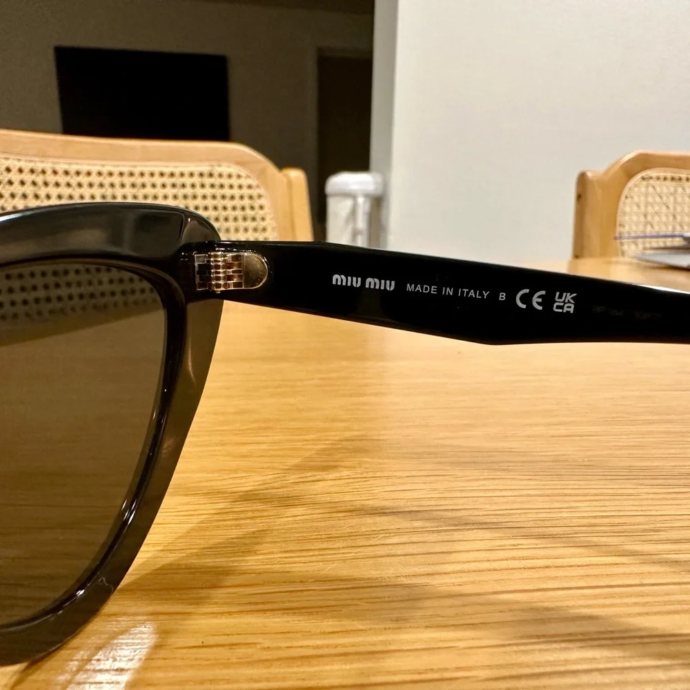 Miu Miu Black Cat-Eye Women's Sunglasses